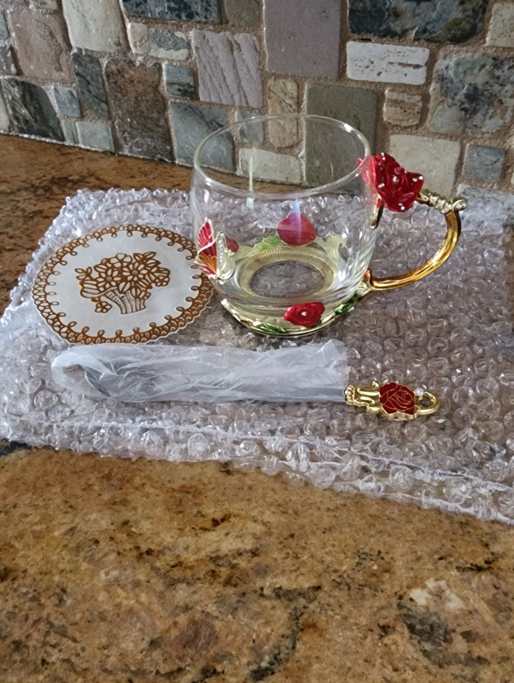Glass Tea Cup with Gold Handle and Red Rose Accents